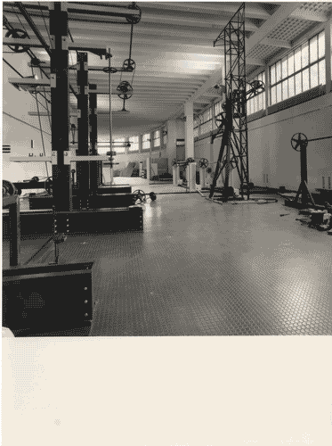 Image for Il luogo del lavoro - Dentro la fabbrica - Una cosmologia a pulegge - Lavori di allestimento della "Stanza delle pulegge"