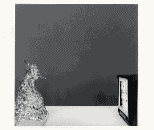 Image for XVII Triennale - Le città del mondo e il futuro delle metropoli - Oltre la città la metropoli - sezione Arte (produzione artistica e comportamenti culturali) - "TV Buddha" di Nam June Paik